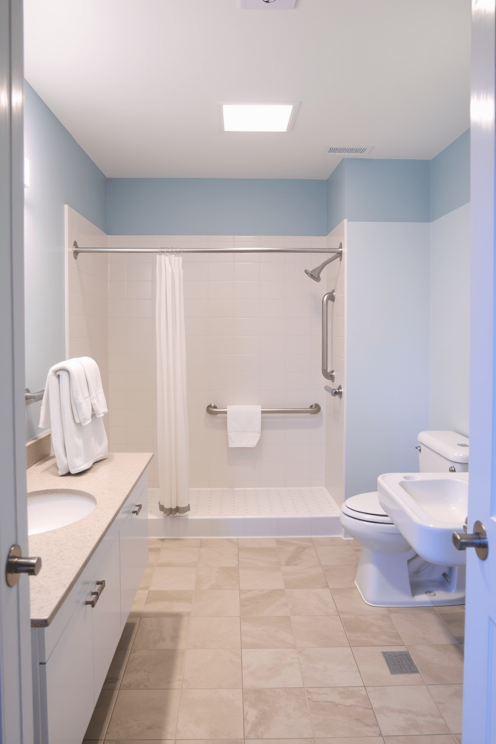 A spacious ADA-compliant bathroom features easy-to-reach towel bars conveniently positioned within arm's reach of the sinks. The design includes grab bars beside the shower and toilet, ensuring safety and accessibility for all users. The color palette consists of soft neutrals and calming blues, creating a serene atmosphere. Large format tiles on the floor enhance the sense of space while providing slip resistance for safety.