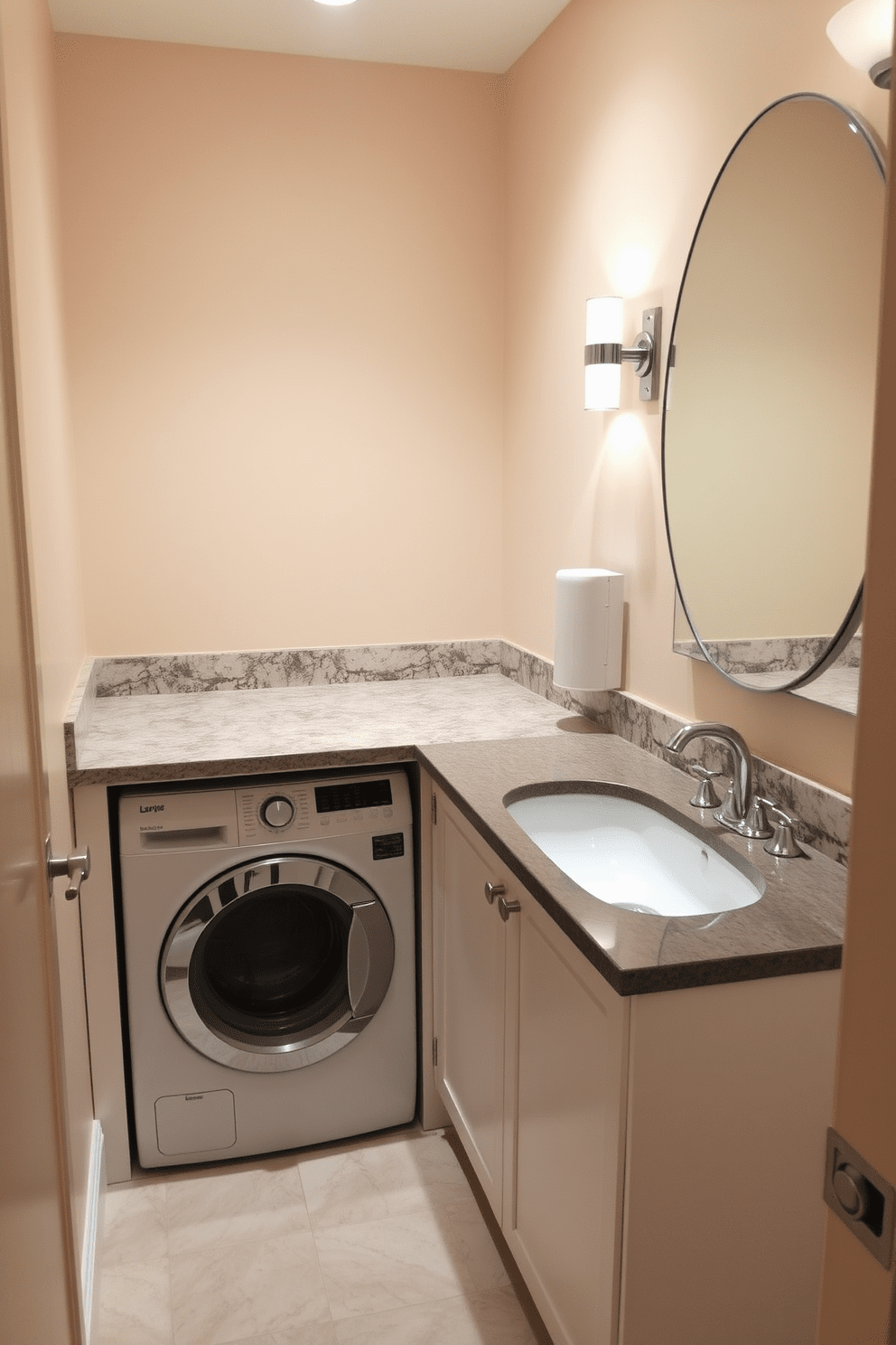 Accessible laundry facilities within bathroom ADA Bathroom Design Ideas. The space includes a compact washer and dryer unit tucked beneath a countertop with ample workspace. The walls are painted in a soft beige tone, creating a warm and inviting atmosphere. A large, accessible sink is positioned next to the laundry area, with grab bars installed for safety and convenience.