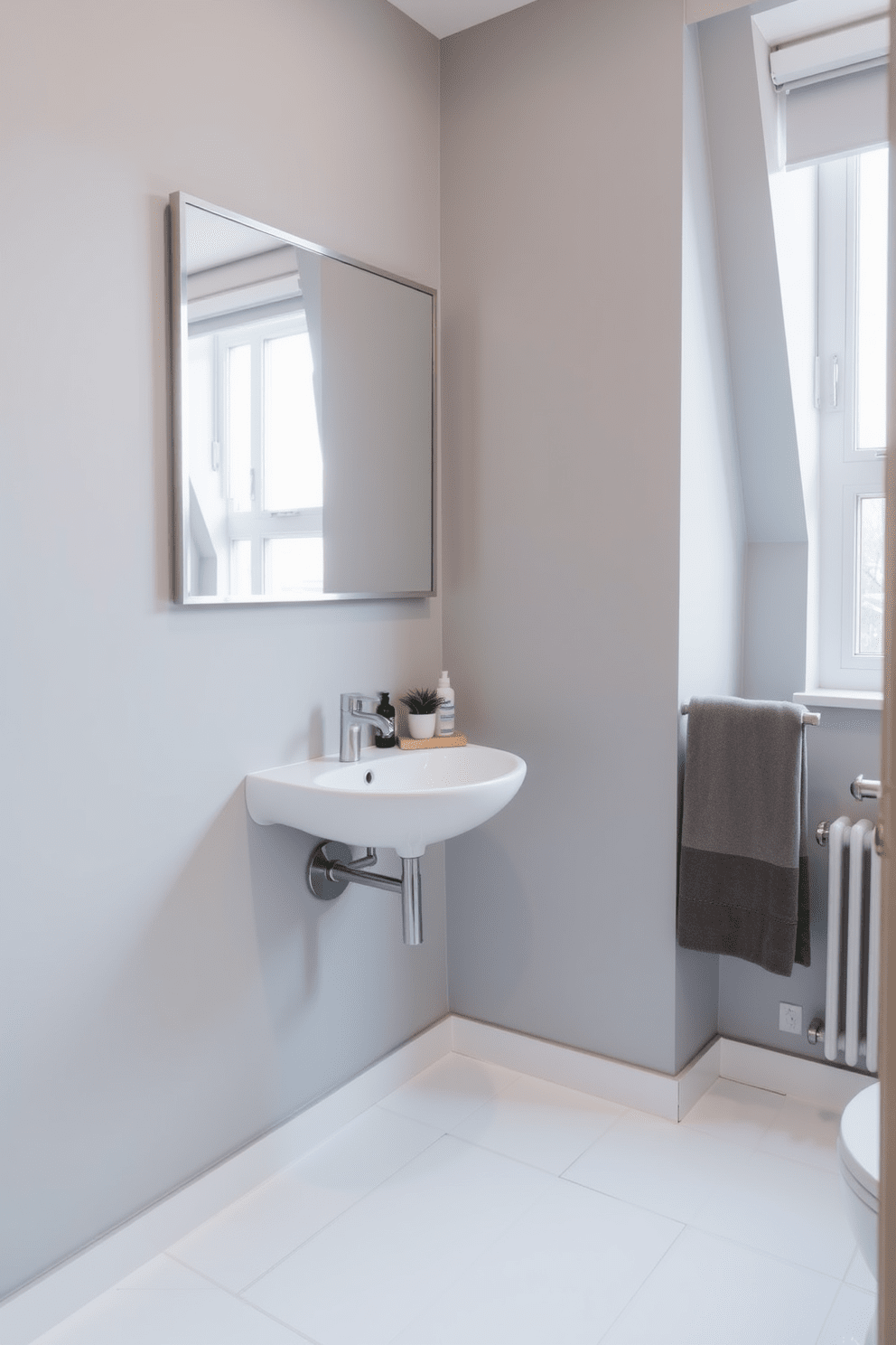 A modern apartment bathroom featuring a corner sink to maximize space efficiency. The walls are painted in a soft gray hue, and the floor is adorned with sleek white tiles for a clean look. Above the sink, a minimalist mirror is framed in brushed nickel, reflecting the natural light from a nearby window. A small wooden shelf holds neatly arranged toiletries, while a potted plant adds a touch of greenery to the decor.