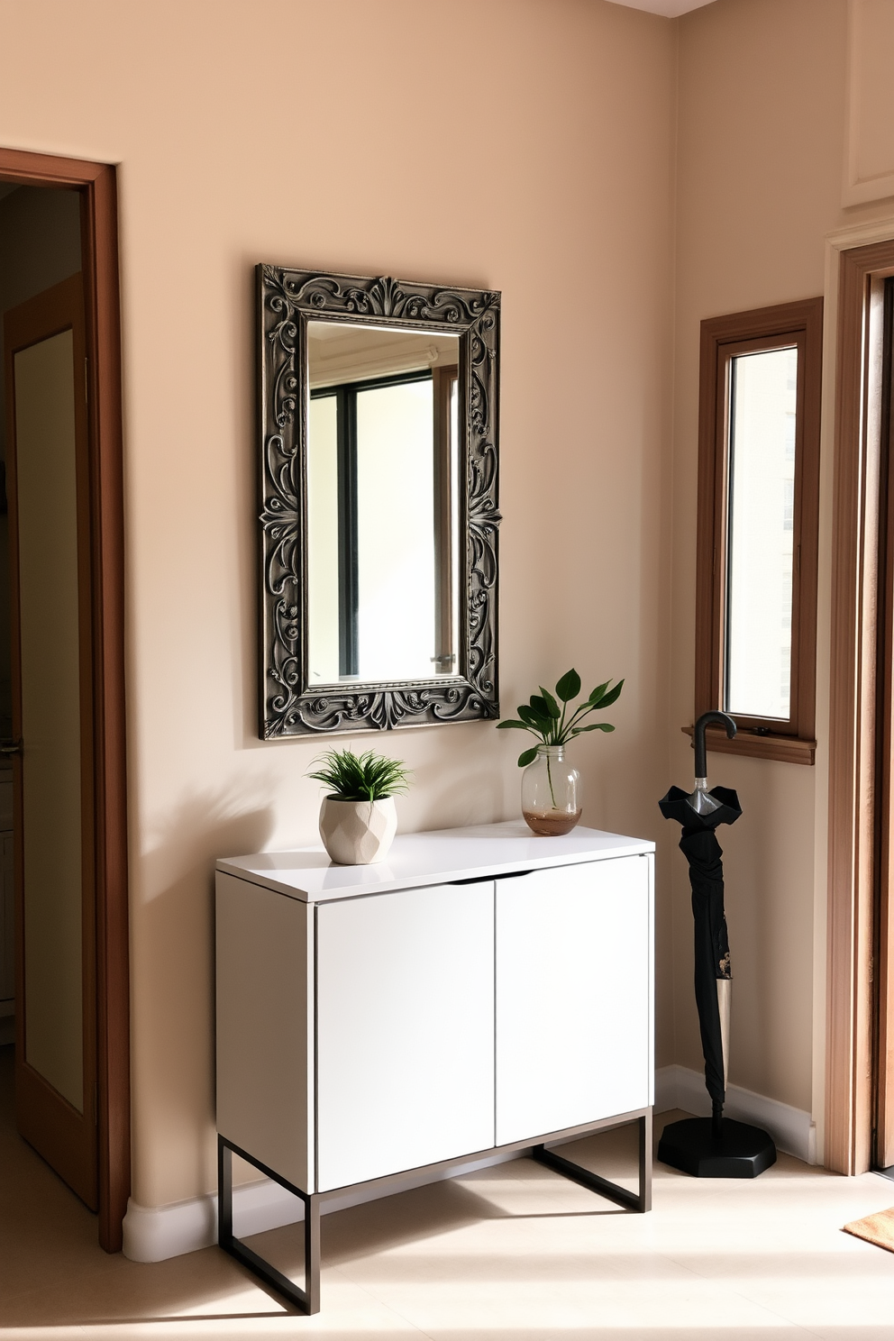 A stylish apartment entryway features a sleek console table against the wall, topped with a decorative mirror that reflects natural light. To the side, a decorative umbrella stand adds a touch of elegance while providing functionality for rainy days. The walls are painted in a soft beige, creating a warm and inviting atmosphere. A small potted plant sits on the console table, enhancing the entryway's charm and welcoming guests into the home.