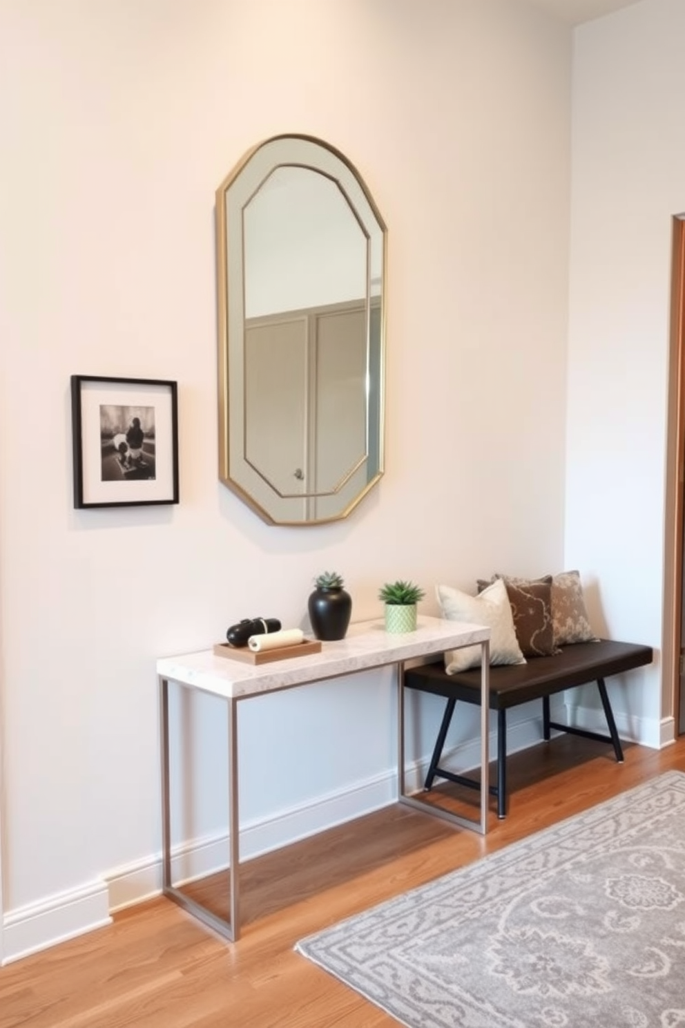 A stylish apartment entryway features a statement mirror that reflects the light and enhances the space. The walls are adorned with a soft pastel color, and a sleek console table sits beneath the mirror, topped with decorative items and a small plant. To the side, a cozy bench with plush cushions invites guests to sit and remove their shoes. The floor is finished with a warm wood that complements the overall design, while a patterned rug adds a touch of texture and warmth.