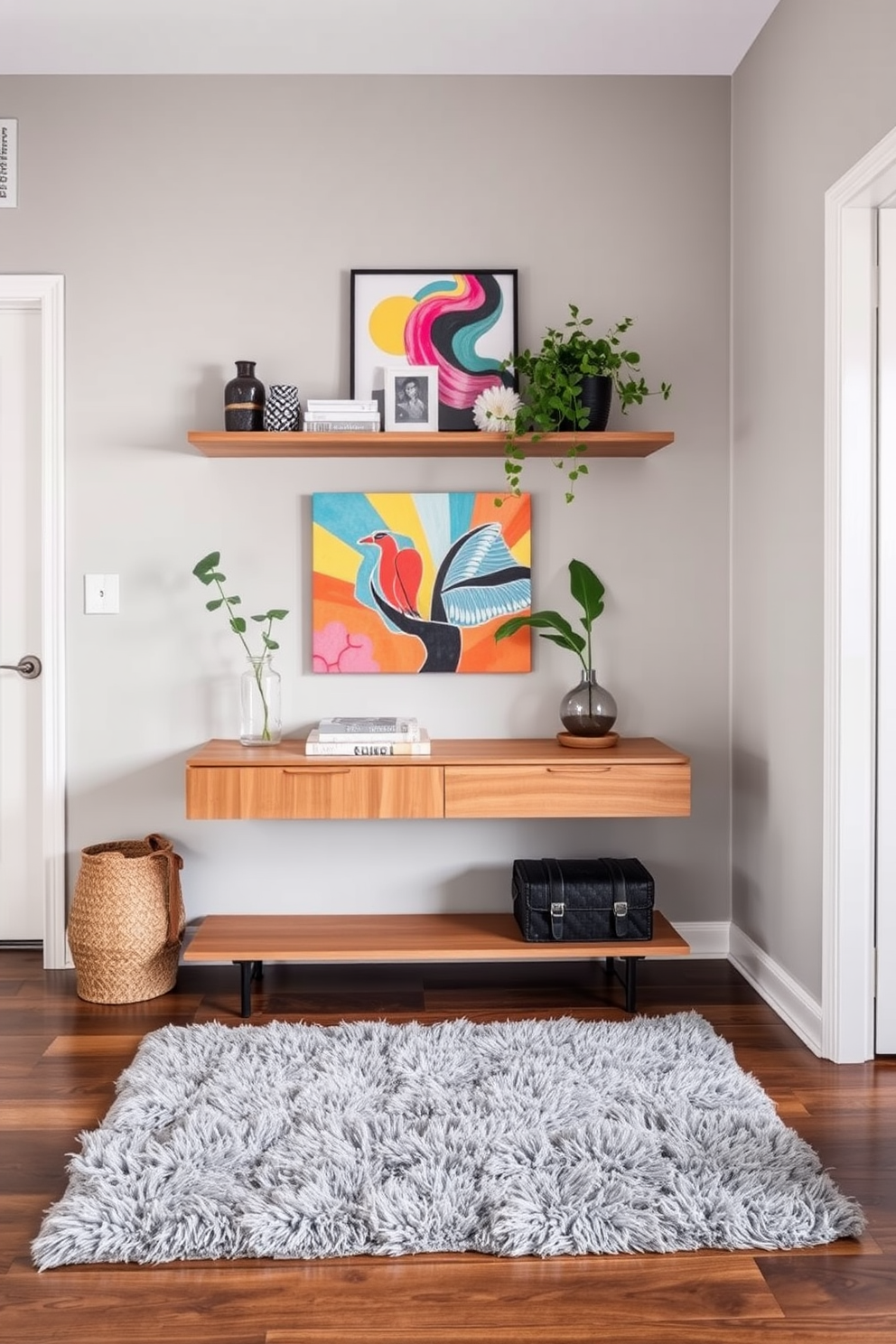 A stylish apartment entryway features a sleek console table against the wall with a warm wood finish. Above the table, floating shelves display a curated selection of decorative items and plants, enhancing the welcoming atmosphere. The walls are painted in a soft gray tone, complemented by a vibrant artwork piece that adds a pop of color. A plush area rug lies beneath the table, inviting guests into the space while providing comfort and style.