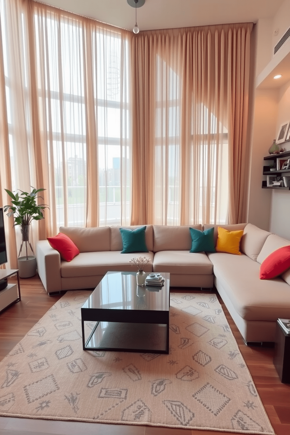 A cozy apartment living room features large windows dressed in soft, flowing curtains that create an inviting atmosphere. The space is anchored by a plush sectional sofa in a neutral tone, complemented by vibrant throw pillows that add a pop of color. A sleek coffee table sits at the center, surrounded by a stylish area rug that defines the seating area. On the walls, framed artwork and decorative shelves showcase personal touches, enhancing the overall warmth of the room.