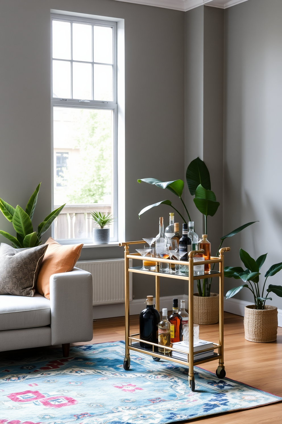 A stylish apartment living room featuring a sleek bar cart positioned near a modern sofa. The walls are painted in a soft gray hue, complemented by a vibrant area rug that adds warmth to the space. Large windows allow natural light to flood the room, highlighting decorative plants placed strategically around the area. The bar cart is elegantly styled with an assortment of glassware and a selection of premium spirits, creating an inviting atmosphere for entertaining guests.