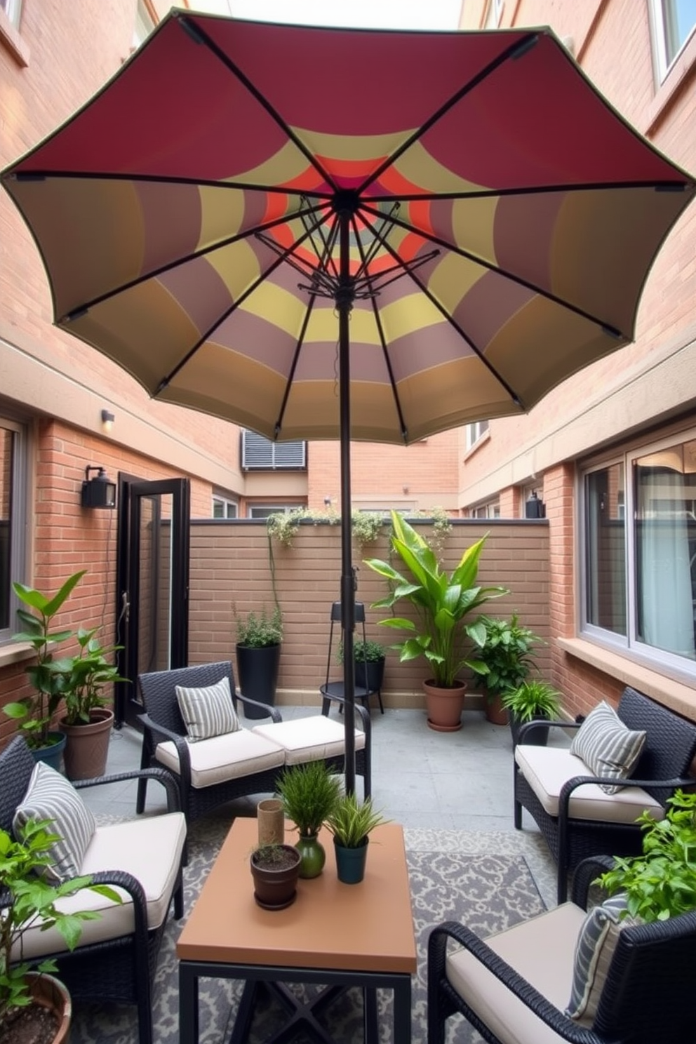 A stylish apartment patio featuring a large, colorful umbrella providing shade on sunny days. The space is adorned with comfortable outdoor seating, potted plants, and a small coffee table, creating an inviting atmosphere for relaxation and gatherings.