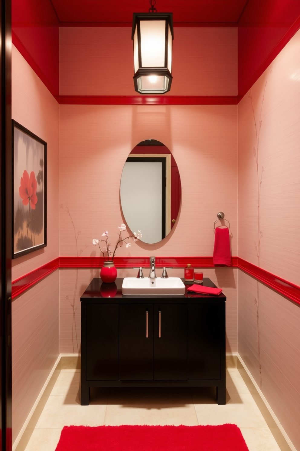 A serene Asian-inspired powder room featuring vibrant red accents that create a bold contrast against neutral tones. The space includes a sleek black vanity with a white sink, complemented by red decorative elements such as a framed artwork and a small vase of cherry blossoms. The walls are adorned with a subtle bamboo wallpaper that adds texture while enhancing the Asian theme. A stylish lantern light fixture hangs from the ceiling, casting a warm glow over the room and highlighting the rich red accents.