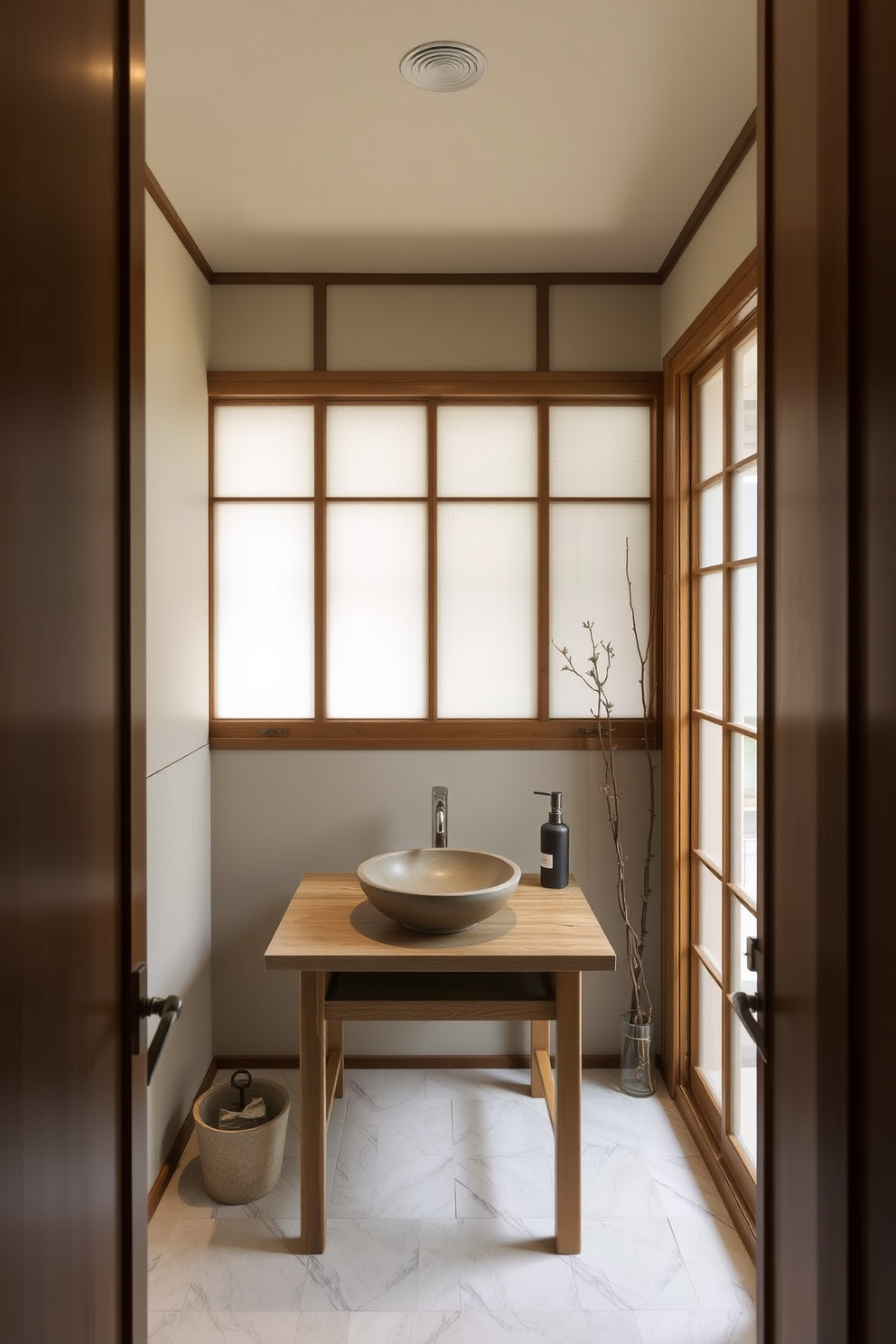 A serene Asian powder room featuring traditional shoji screens that provide privacy while allowing soft light to filter through. The room is adorned with a delicate wooden vanity topped with a natural stone sink and accented by subtle bamboo decor.