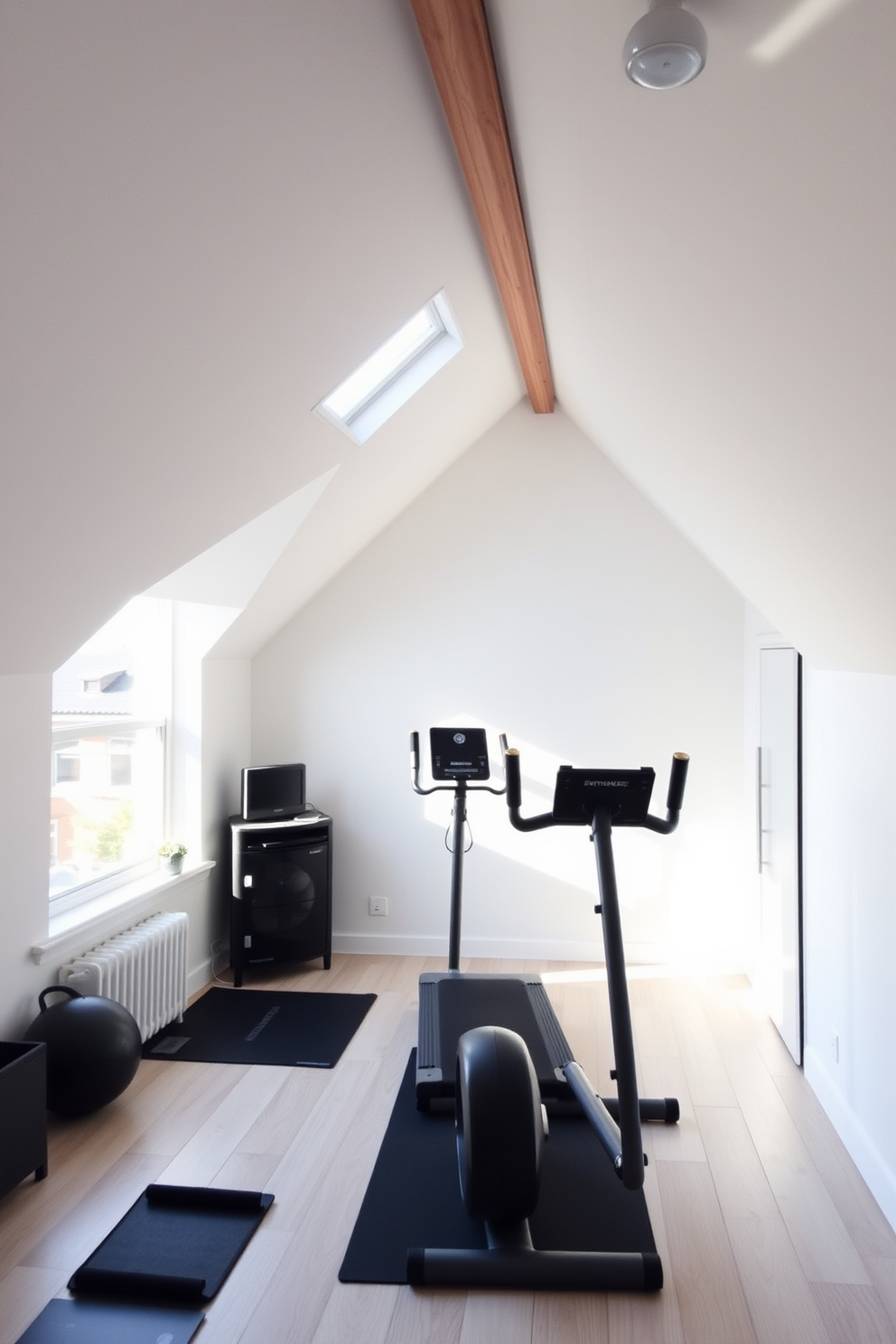 Create a personal gym with minimal equipment. The space features a large window that brings in natural light, with light wood flooring and white walls for an airy feel. Attic apartment design ideas should focus on maximizing space while maintaining a cozy atmosphere. Incorporate sloped ceilings with skylights, and use soft neutral colors to enhance the sense of openness.