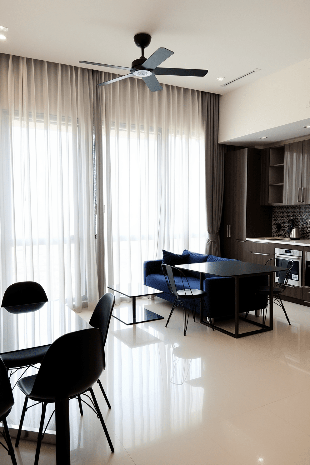 A stylish bachelor apartment featuring an open-plan layout that seamlessly integrates the living, dining, and kitchen areas. The space is defined by floor-to-ceiling sheer curtains that add a touch of elegance while providing privacy when needed. The living area showcases a modern sofa in a deep navy hue paired with a sleek glass coffee table. A minimalist dining table with black metal chairs sits adjacent to the kitchen, which boasts stainless steel appliances and a striking backsplash.