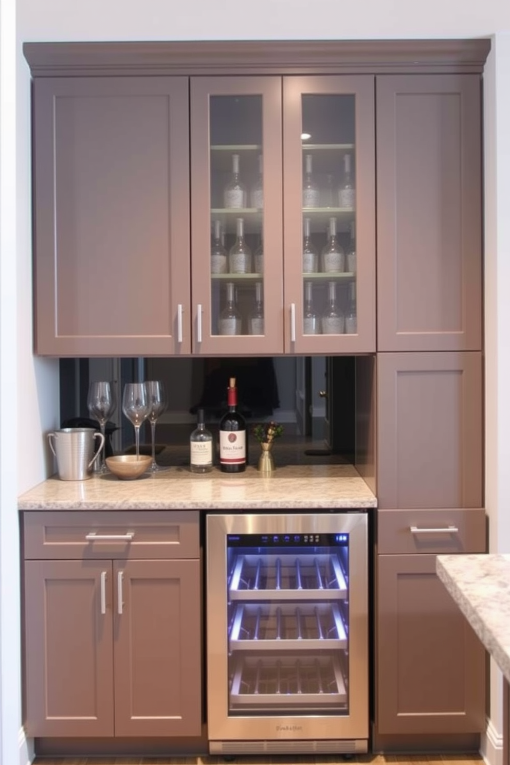 A stylish basement dry bar featuring a built-in wine cooler for convenience. The bar is designed with sleek cabinetry and a polished countertop, creating an inviting space for entertainment.