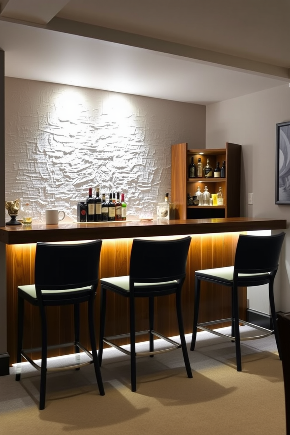 A stylish basement dry bar featuring a sleek wooden bar counter with elegant bar stools. Accent lighting illuminates the space, highlighting the textured wall behind the bar and creating a warm, inviting atmosphere.