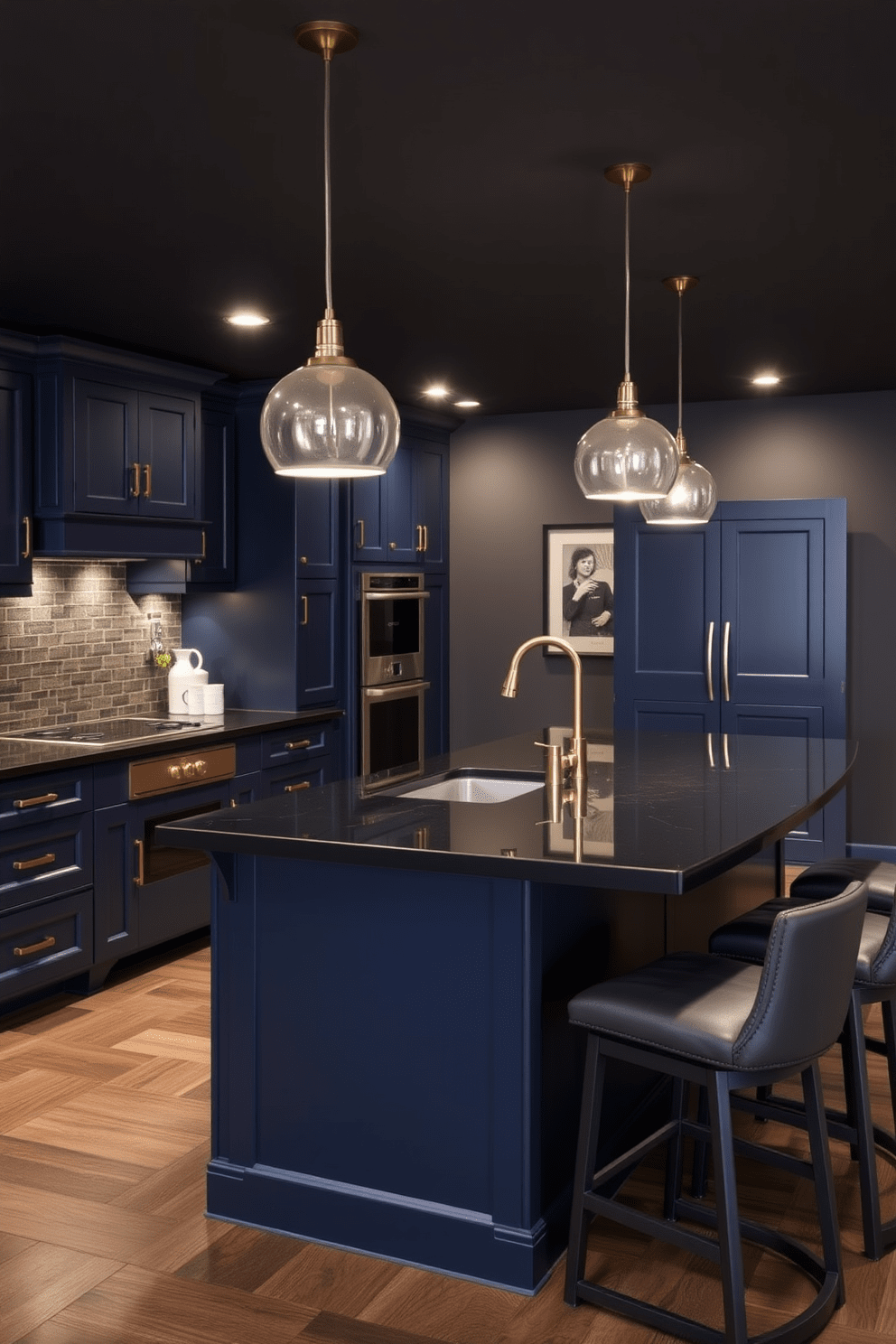 A sophisticated basement kitchen design features deep navy blue cabinetry paired with sleek black countertops. The space is illuminated by modern pendant lights that cast a warm glow over the room. The walls are adorned with rich charcoal gray paint, creating an inviting yet dramatic atmosphere. A large island with bar seating serves as the focal point, complemented by polished brass fixtures and accents.