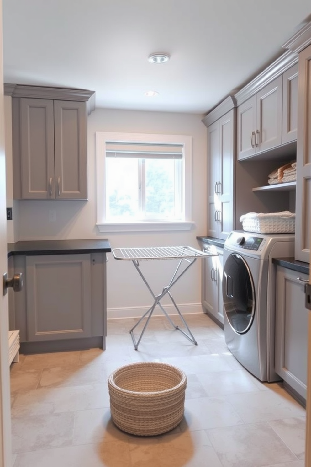 A stylish basement laundry room featuring a spacious layout with ample storage solutions. The room includes a modern washing machine and dryer set, surrounded by custom cabinetry in a soft gray finish. A drying rack for delicate items is conveniently placed near the window, allowing for natural light to brighten the space. The walls are painted in a light, airy color, and the floor is covered with durable, water-resistant tiles for practicality.