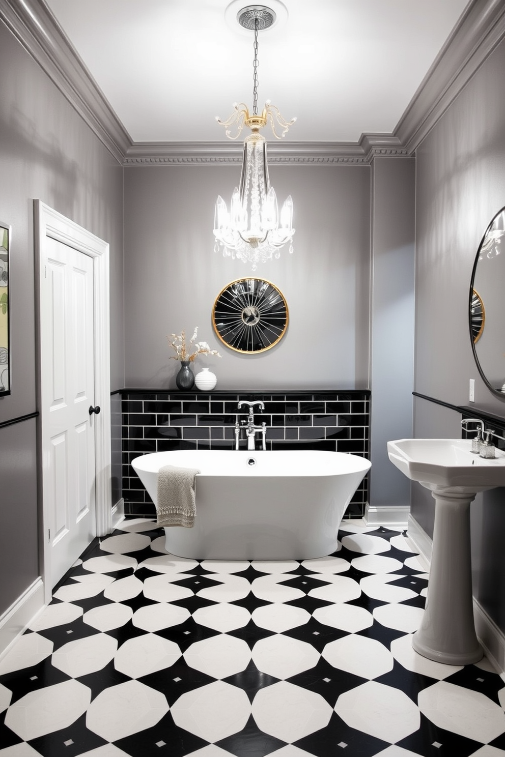 An elegant basement washroom features a striking black and white tile design that creates a timeless aesthetic. The walls are painted in a soft gray, complementing the bold floor tiles while providing a cozy atmosphere. A sleek freestanding bathtub sits at the center, surrounded by minimalist decor. Above the tub, a modern chandelier adds a touch of sophistication, illuminating the space beautifully.