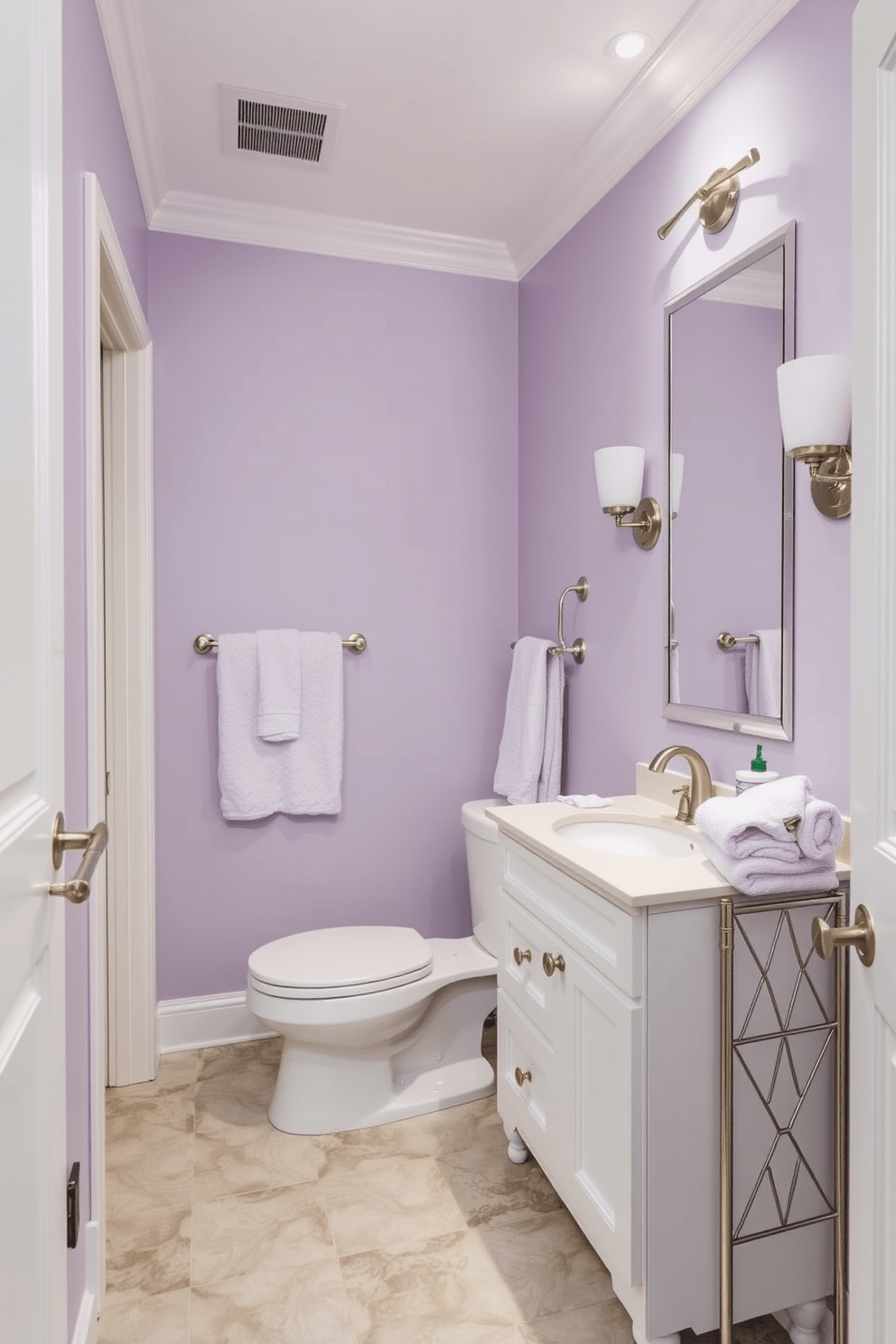 A serene retreat bathroom features walls painted in a pale lavender hue that creates a calming atmosphere. The space is accented with white cabinetry and brushed nickel fixtures, enhancing the tranquil vibe. The flooring consists of light gray tiles that complement the lavender walls beautifully. Soft, fluffy towels in coordinating shades are neatly arranged on a stylish rack, adding to the overall elegance of the design.