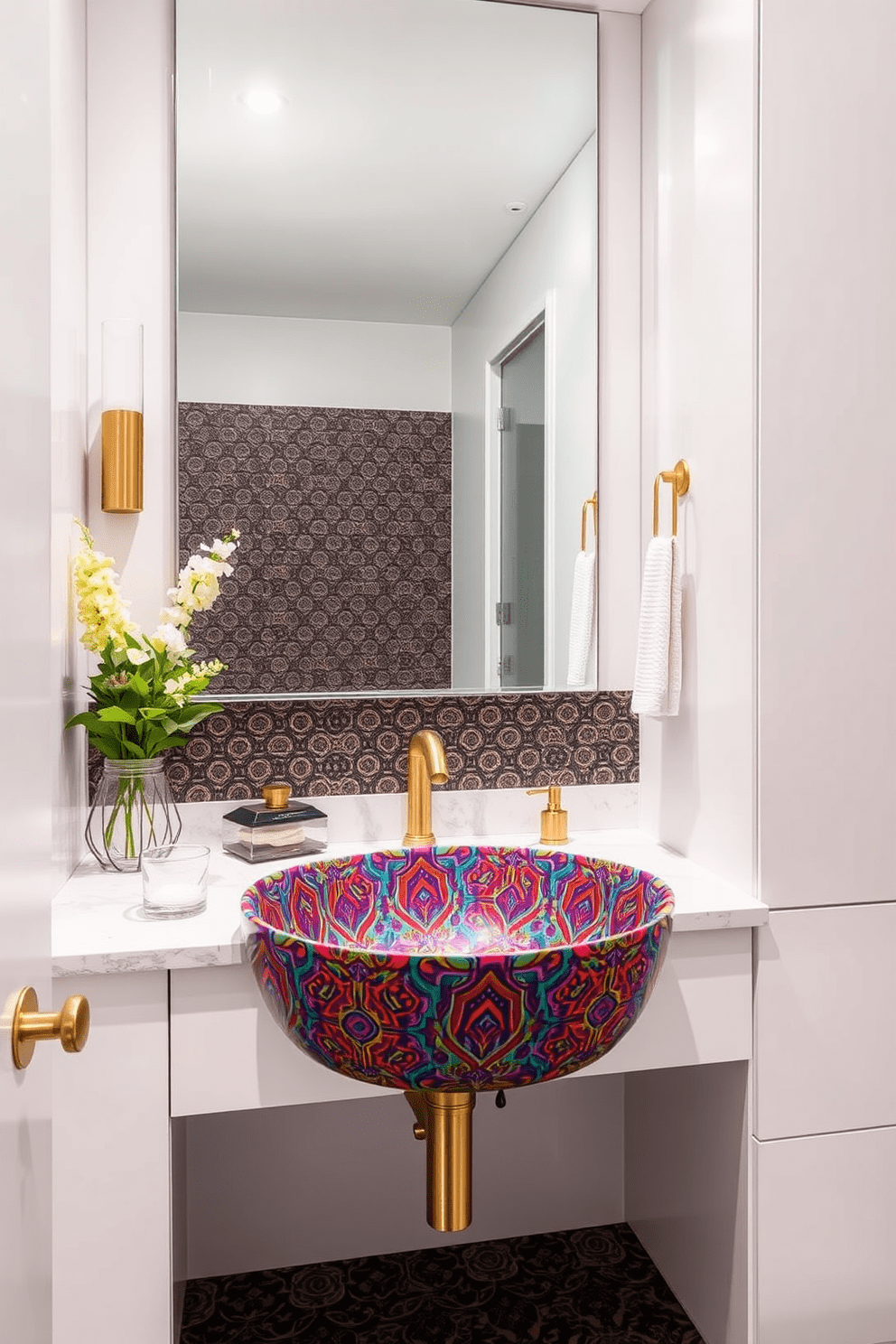 A bold patterned sink serves as the focal point of this striking bathroom design. The vibrant colors and intricate patterns create a stunning contrast against the sleek white cabinetry and minimalist decor. Surrounding the sink, stylish fixtures in brushed gold enhance the luxurious feel of the space. A large, frameless mirror above the sink reflects the bold design, adding depth and brightness to the room.