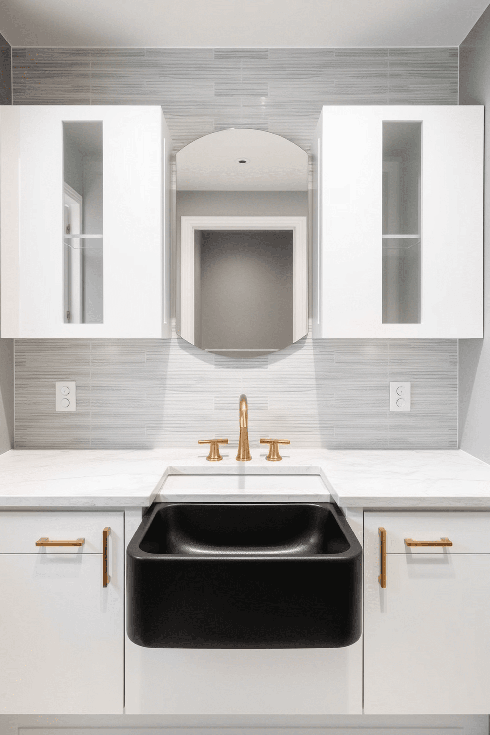 A bold black sink serves as the centerpiece of a striking bathroom design. Surrounding the sink, sleek white cabinetry contrasts beautifully with the dark tone, enhancing the overall aesthetic. The walls are adorned with textured tiles in soft gray, creating a sophisticated backdrop. Complementing the sink, a modern faucet in brushed gold adds a touch of elegance and warmth to the space.