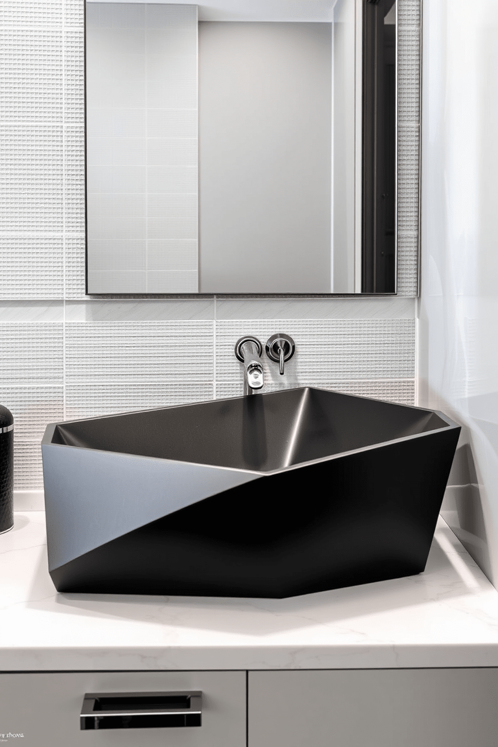 A unique geometric sink is the centerpiece of this bold bathroom design. It features sharp angles and a matte black finish, contrasting beautifully against the light-colored marble countertop. Surrounding the sink are sleek, modern fixtures in polished chrome, adding a touch of elegance. The walls are adorned with textured tiles in a soft gray, creating a sophisticated backdrop for the striking sink.