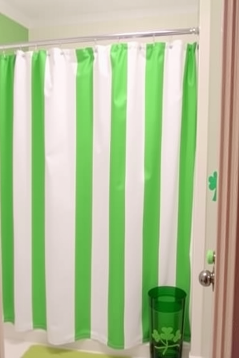 Create an inviting bathroom scene featuring a green and white striped shower curtain that adds a fresh and vibrant touch. Incorporate St. Patrick's Day decorating ideas, such as shamrock-themed accessories and subtle green accents throughout the space to celebrate the holiday.