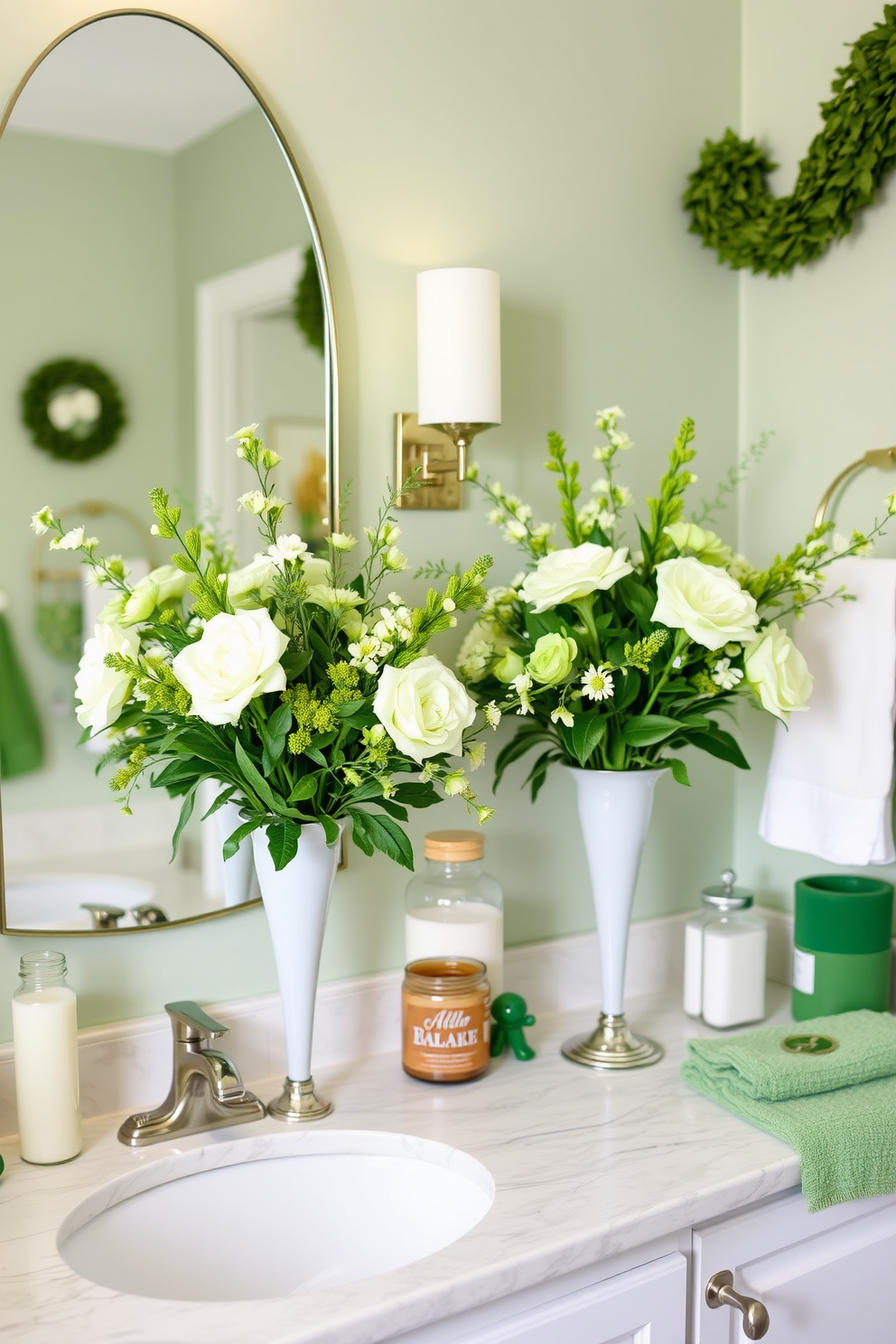 A charming bathroom adorned with green floral arrangements in elegant vases. The vases are artfully placed on the countertop, bringing a fresh and lively touch to the space. The decor features subtle hints of St. Patrick's Day, with accents of gold and white interspersed throughout. Soft green towels and themed decorations create a festive yet sophisticated atmosphere.