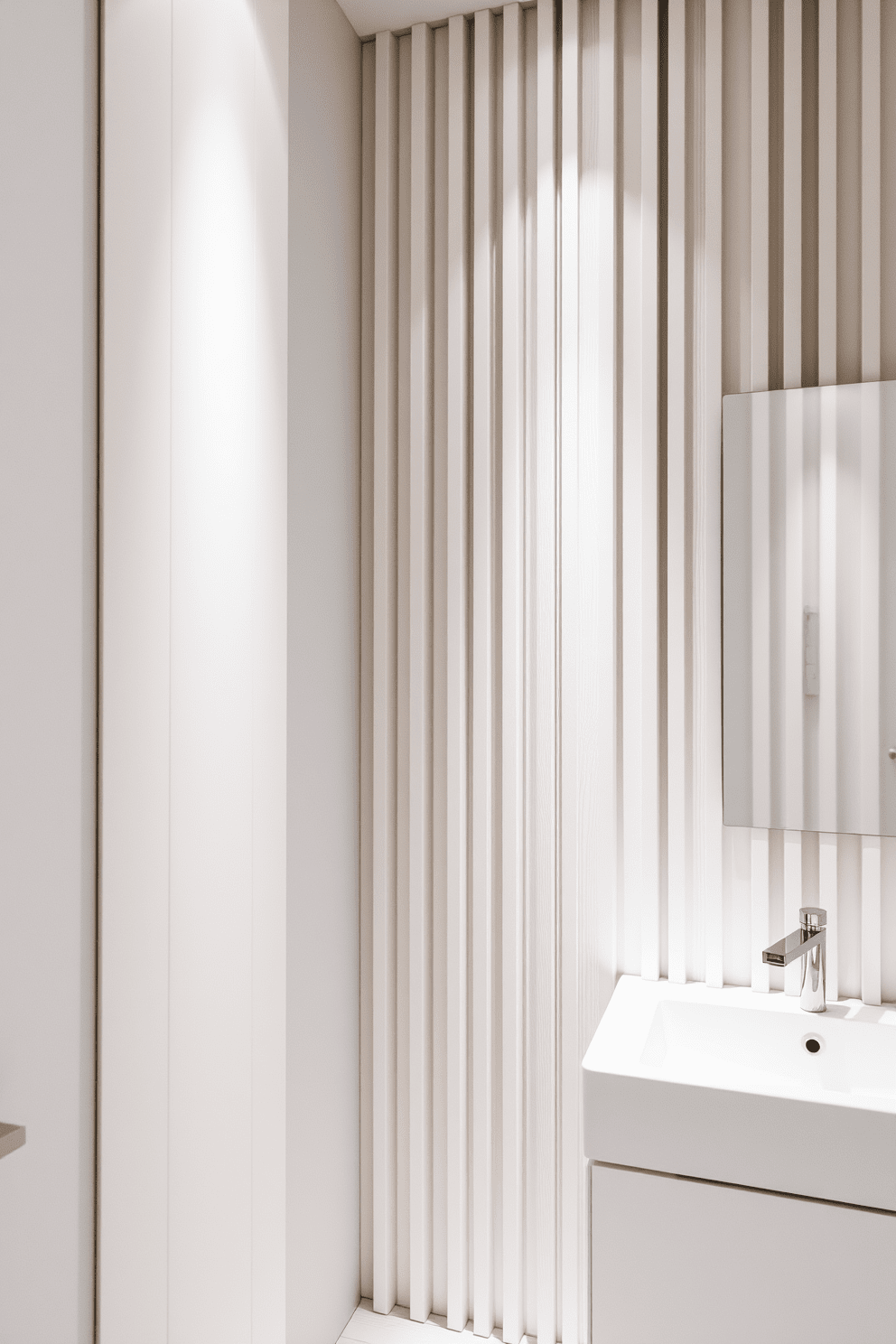 A stunning bathroom design featuring vertical wood slats that create an illusion of added height. The slats are painted in a soft white tone, enhancing the brightness of the space while providing a modern touch. The walls are complemented by subtle textures, such as a smooth matte finish or gentle patterns that add depth. Thoughtfully placed lighting fixtures highlight the wood slats, casting soft shadows that enhance the room's ambiance.