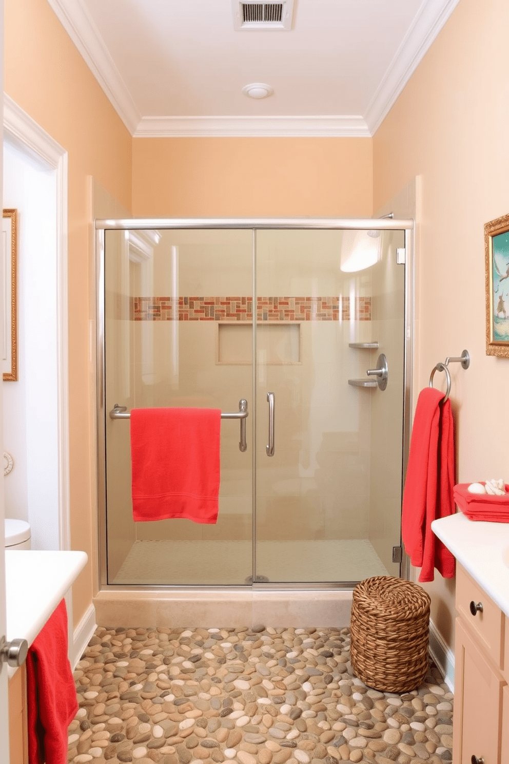 Bright coral accents bring a vibrant pop of color to this beach-inspired bathroom. The walls are painted a soft sandy beige, complementing the coral hues in the decorative accessories and towels. A spacious shower area features clear glass doors and a pebble stone floor for a natural feel. Nautical-themed artwork and seashell decor complete the coastal ambiance, creating a serene retreat.