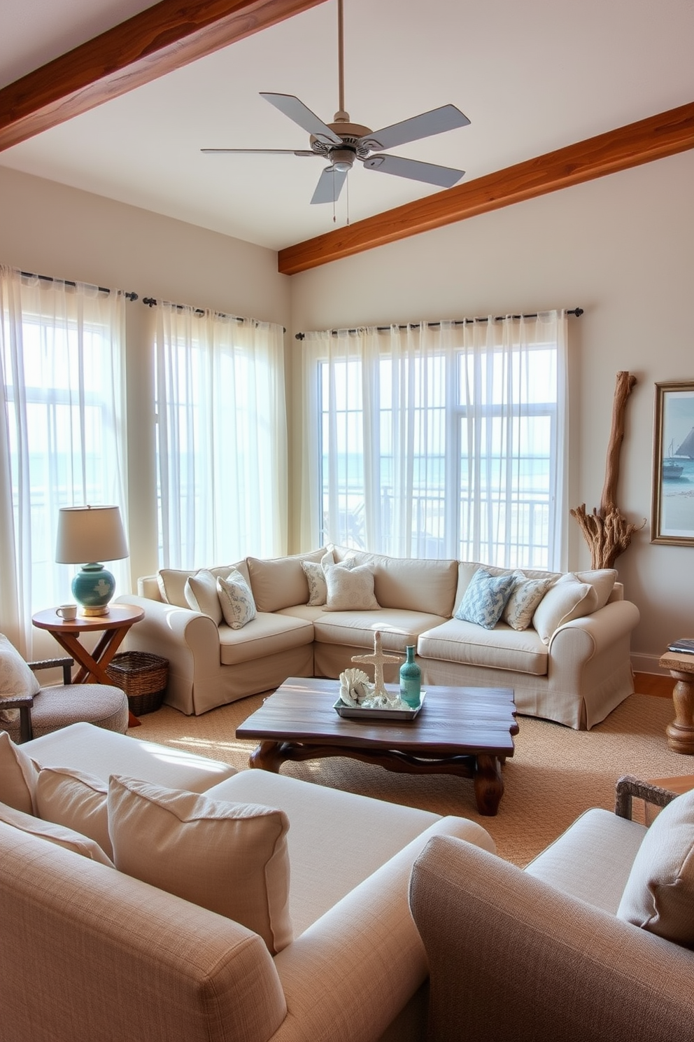 A cozy beach living room with driftwood accents creates a rustic yet inviting atmosphere. The walls are painted in soft sandy tones, and natural light floods the space through large windows adorned with sheer white curtains. A large sectional sofa in a light fabric is paired with a reclaimed wood coffee table. Nautical-themed decor, such as seashells and coastal artwork, enhances the beachy vibe of the room.