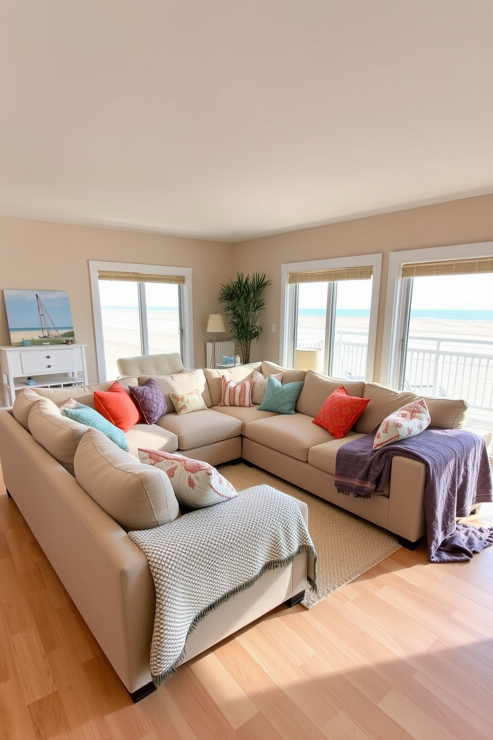 A comfortable sectional sofa with plush cushions is positioned in the center of the room, inviting family members to relax and unwind. Surrounding the sectional are soft, textured throw blankets and vibrant decorative pillows that enhance the cozy atmosphere. Large windows allow natural light to flood the space, showcasing views of the beach outside. The walls are painted in a soft sandy beige, while the floor features light hardwood that complements the coastal vibe of the living room.