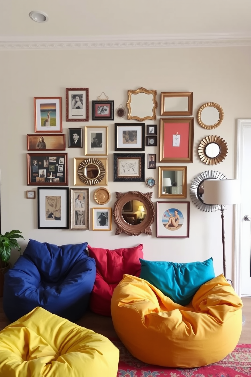 A cozy living room featuring vibrant bean bags arranged beneath an eclectic gallery wall. The gallery showcases a mix of framed artwork, photographs, and decorative mirrors in various sizes and styles.