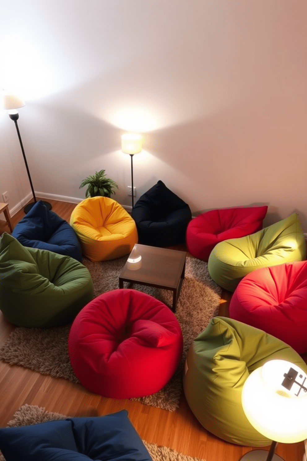 A cozy living room featuring several colorful bean bags arranged in a casual layout. Soft ambient lighting from floor lamps creates a warm and inviting atmosphere, perfect for relaxation and socializing. The walls are painted in a light neutral tone, allowing the vibrant bean bags to stand out. A low coffee table sits in the center, surrounded by plush rugs that add texture and comfort to the space.