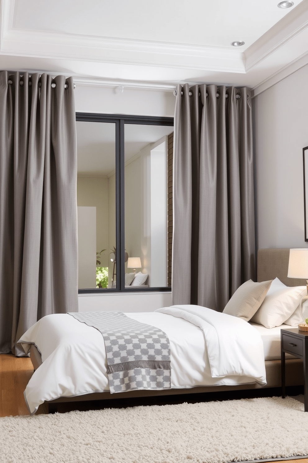 A contemporary bedroom featuring grommet-top curtains in a soft gray fabric that elegantly frame a large window. The curtains cascade to the floor, complementing a sleek minimalist bed with crisp white linens and a geometric patterned throw blanket. The room is adorned with subtle decorative elements, including a modern bedside table and a stylish lamp casting a warm glow. A plush area rug in neutral tones adds comfort underfoot, enhancing the overall serene atmosphere of the space.