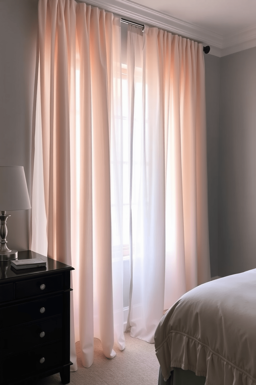 A serene bedroom featuring sheer curtains layered over blackout panels. The sheer curtains softly diffuse natural light while the blackout panels provide privacy and darkness when needed.