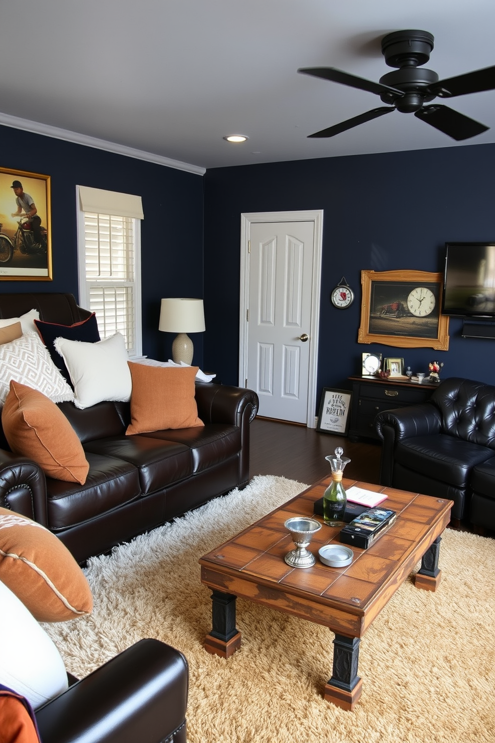 A cozy bedroom featuring a leather sofa adorned with oversized throw pillows in various textures and colors. The walls are painted a deep navy blue, creating a serene atmosphere, while a plush area rug anchors the space. A stylish man cave designed for relaxation and entertainment. The room includes a large leather sectional, a mounted flat-screen TV, and a rustic wooden coffee table surrounded by vintage memorabilia.