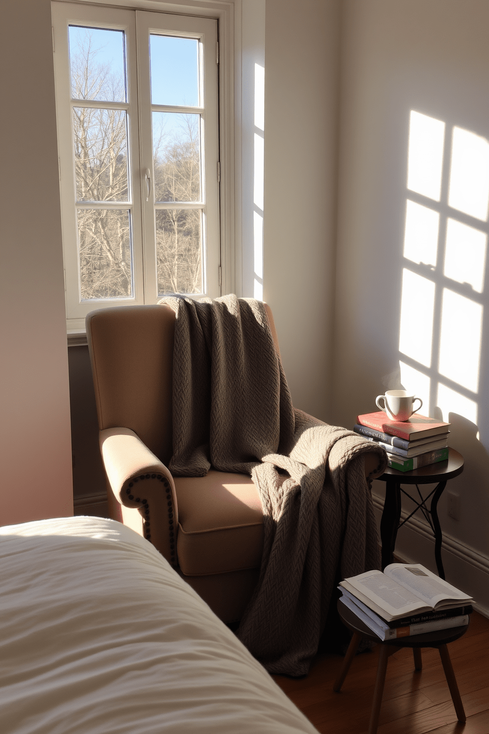 A sunlit corner features a plush armchair draped with a cozy blanket, inviting relaxation and comfort. A small side table holds a stack of books and a steaming cup of tea, enhancing the serene atmosphere of the bedroom reading nook.