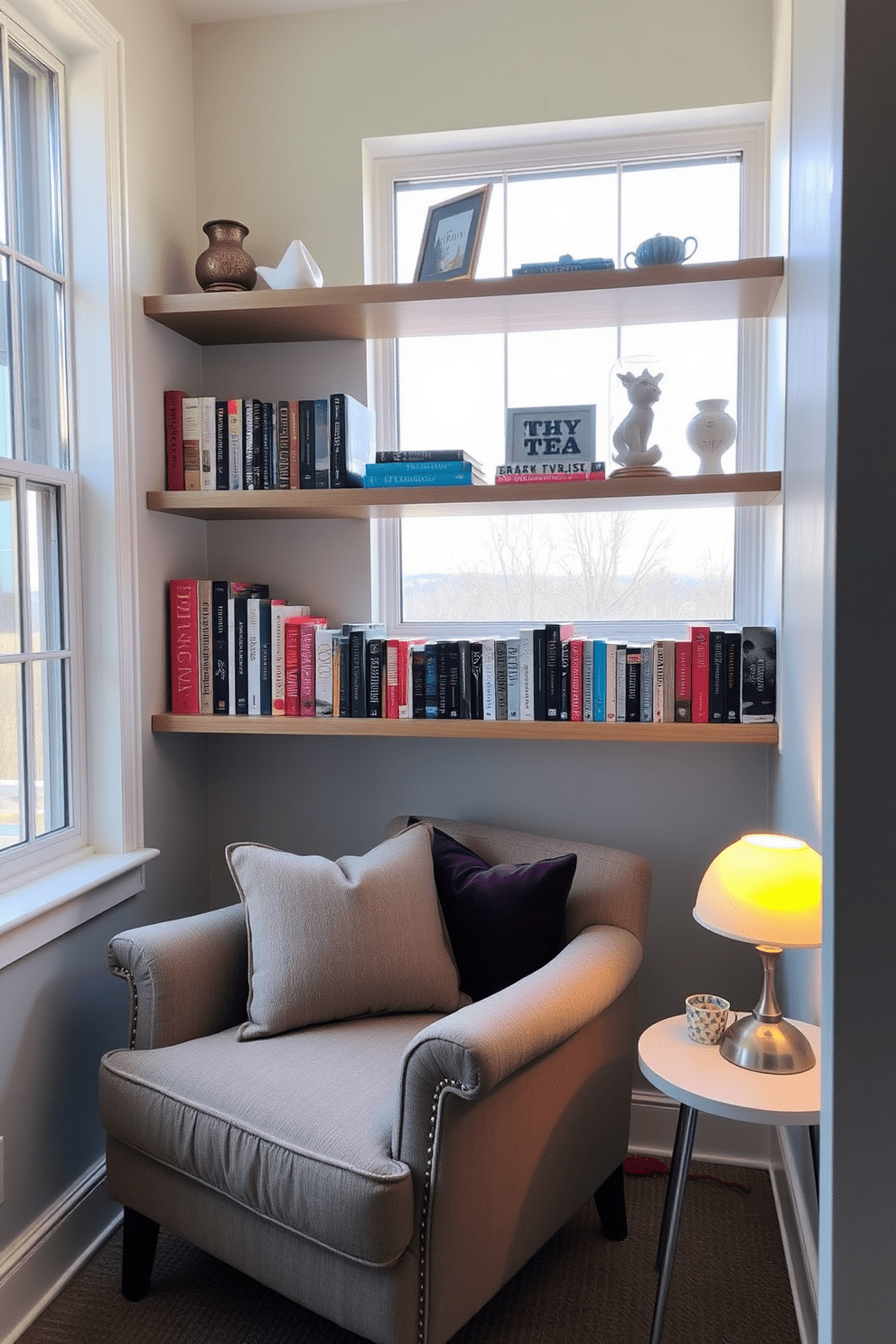 A cozy reading nook features a plush armchair in a soft fabric, positioned near a large window that lets in natural light. Above the chair, floating shelves display an array of books and decorative items, creating an inviting atmosphere for relaxation. The walls are painted in a calming pastel hue, enhancing the serene vibe of the space. A small side table next to the chair holds a warm cup of tea and a reading lamp, perfect for evening reading sessions.