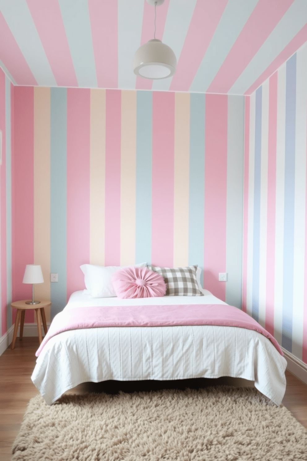 A playful bedroom features painted stripes in alternating pastel colors that create a cheerful atmosphere. The stripes run vertically from floor to ceiling, adding height and a sense of whimsy to the space. The bed is centered against the striped wall, adorned with fluffy pillows in complementary shades. A cozy area rug in a neutral tone anchors the room, providing warmth and comfort underfoot.