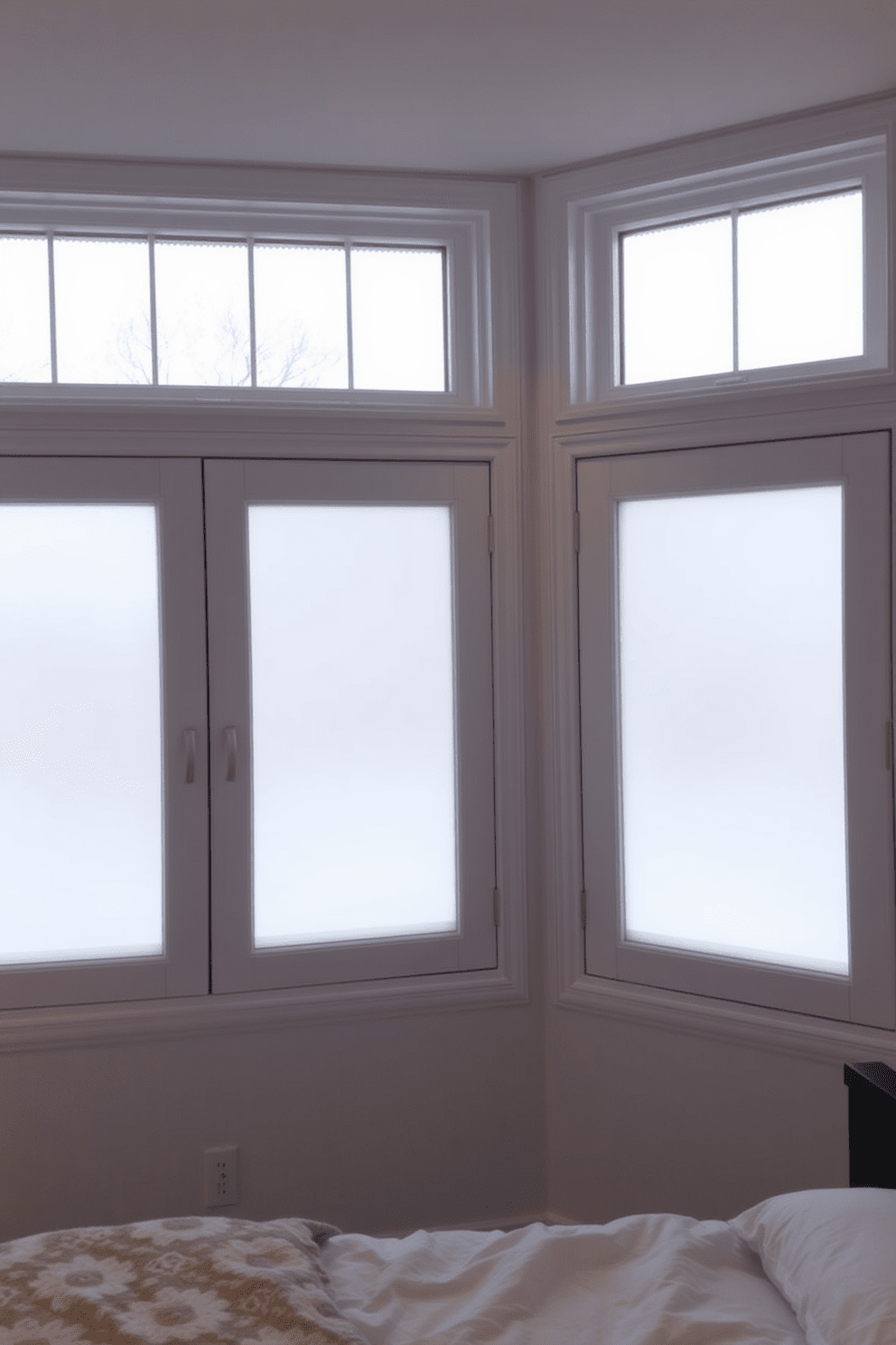 A serene bedroom window design featuring frosted glass panels that provide both privacy and elegance. The soft light filters through the frosted surface, creating a calming ambiance in the room.