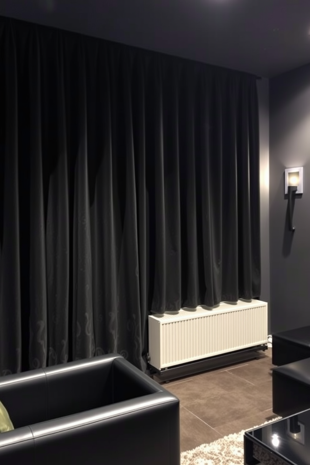 A stylish basement space featuring dark velvet curtains that create an elegant atmosphere. The walls are painted in a deep charcoal color, complemented by sleek black furniture and modern lighting fixtures.