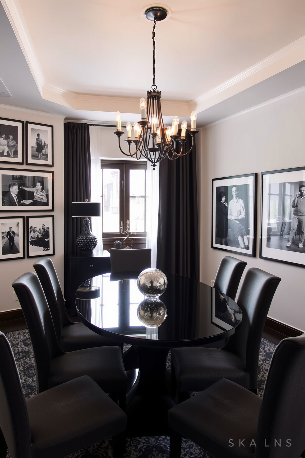 A cozy dining room featuring a sleek black dining table surrounded by elegant upholstered chairs. The walls are adorned with framed black and white photos that evoke a sense of nostalgia, adding character to the space. Soft ambient lighting illuminates the room, creating an inviting atmosphere for gatherings. A statement chandelier hangs above the table, complementing the rich black accents throughout the design.