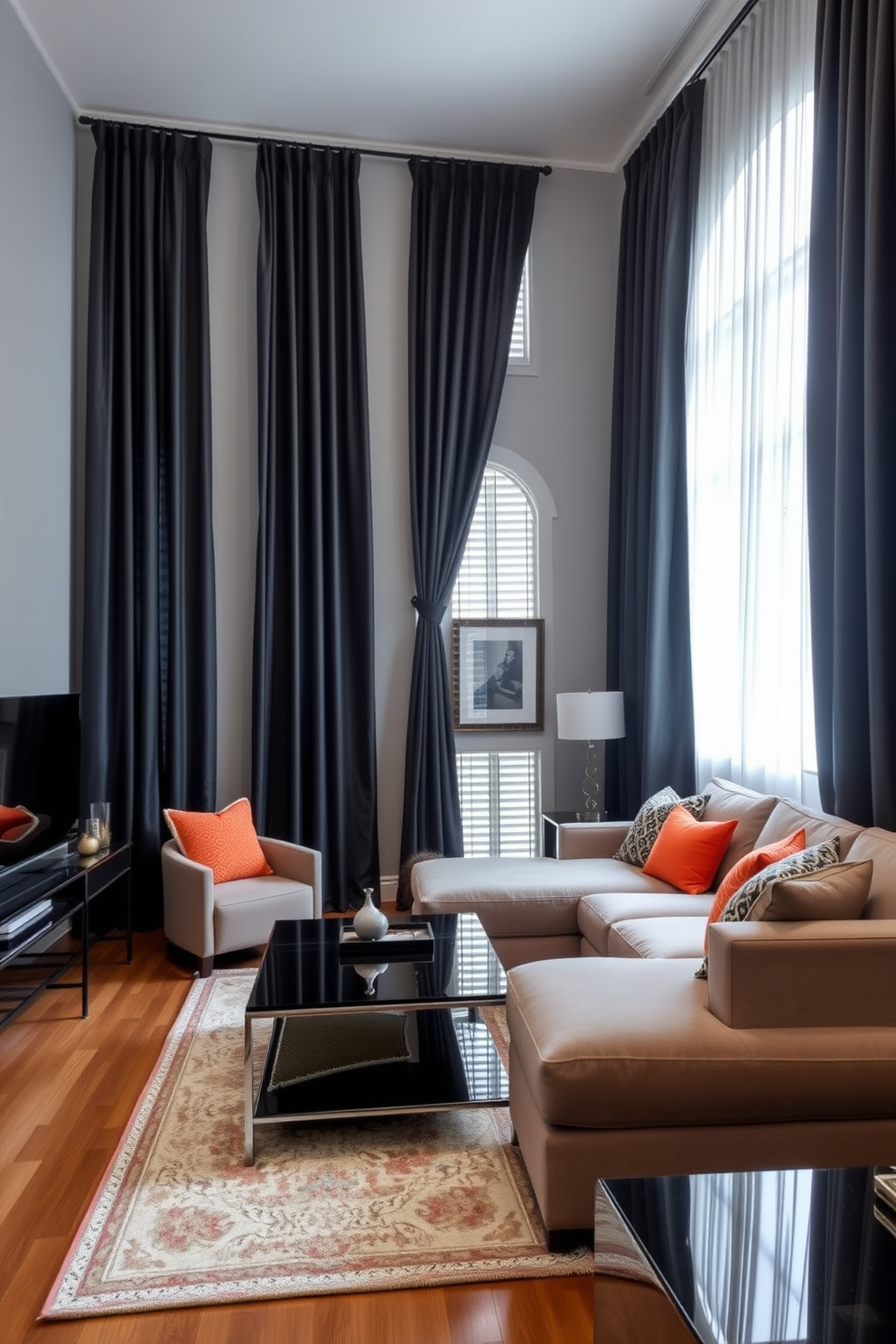 A stylish family room featuring elegant black curtains that create a dramatic effect. The room is designed with a plush sectional sofa in a neutral tone, complemented by vibrant accent pillows and a sleek coffee table. The walls are painted in a soft gray, enhancing the contrast with the dark curtains. A modern entertainment unit sits against one wall, adorned with decorative items and framed artwork that adds personality to the space.