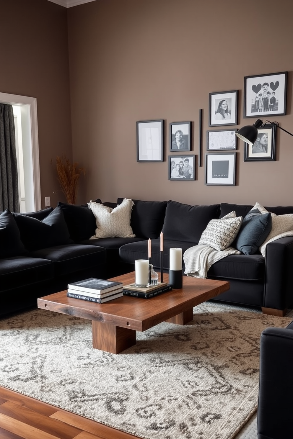 A cozy family room featuring layered textures with black velvet cushions on a plush sectional sofa. The walls are painted in a warm taupe, and a large area rug anchors the space, adding depth and comfort. Incorporate a modern coffee table made of reclaimed wood, topped with decorative books and a stylish candle arrangement. A gallery wall with framed art and family photos adds a personal touch, while a sleek floor lamp provides ambient lighting.