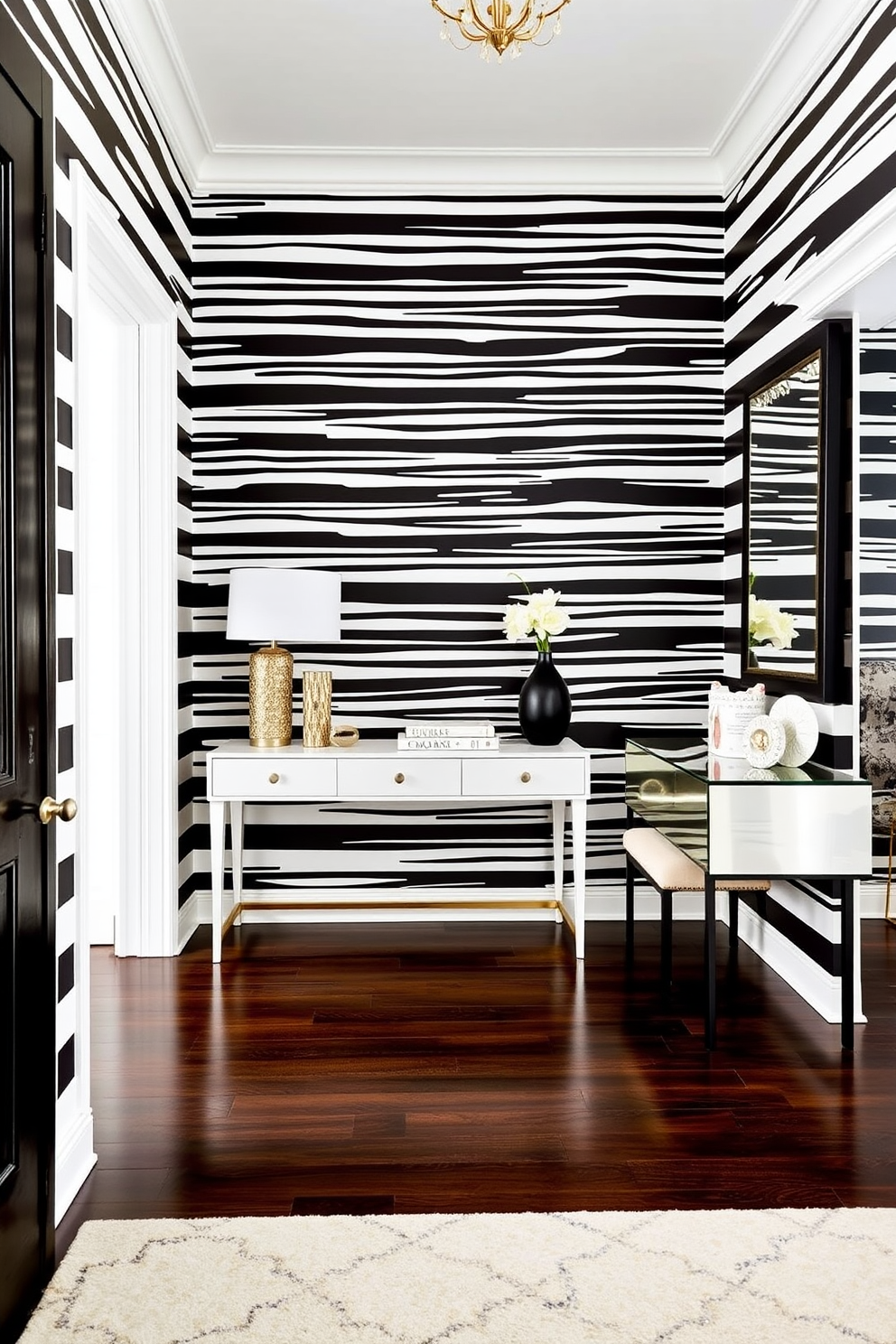 A striking foyer adorned with bold black and white striped wallpaper that creates a dramatic entrance. The floor is a sleek dark hardwood, contrasting beautifully with the vibrant walls, while a stylish console table rests against one side, topped with a decorative mirror and modern accessories.