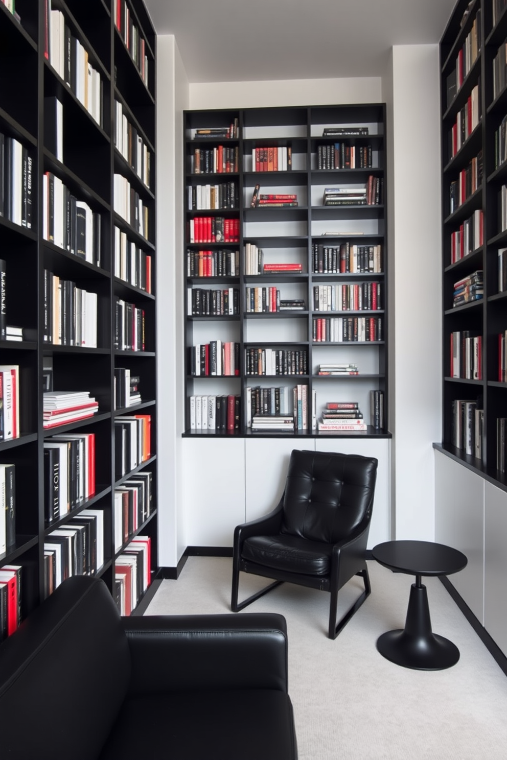 A minimalist home library featuring bold black elements. The room showcases sleek black bookshelves that stretch from floor to ceiling, providing ample storage for an extensive collection of books. A large black leather armchair is positioned in the reading nook, complemented by a simple black side table. The walls are painted in a soft white, creating a striking contrast with the dark furnishings.