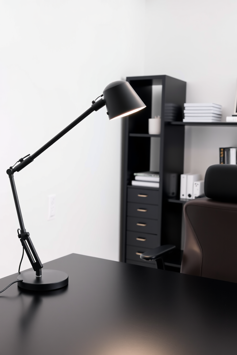 A sleek black desk lamp with an adjustable arm sits on a modern black desk, providing focused lighting for work tasks. The home office features minimalist decor with a dark wood bookshelf and a comfortable ergonomic chair, creating an efficient and stylish workspace.