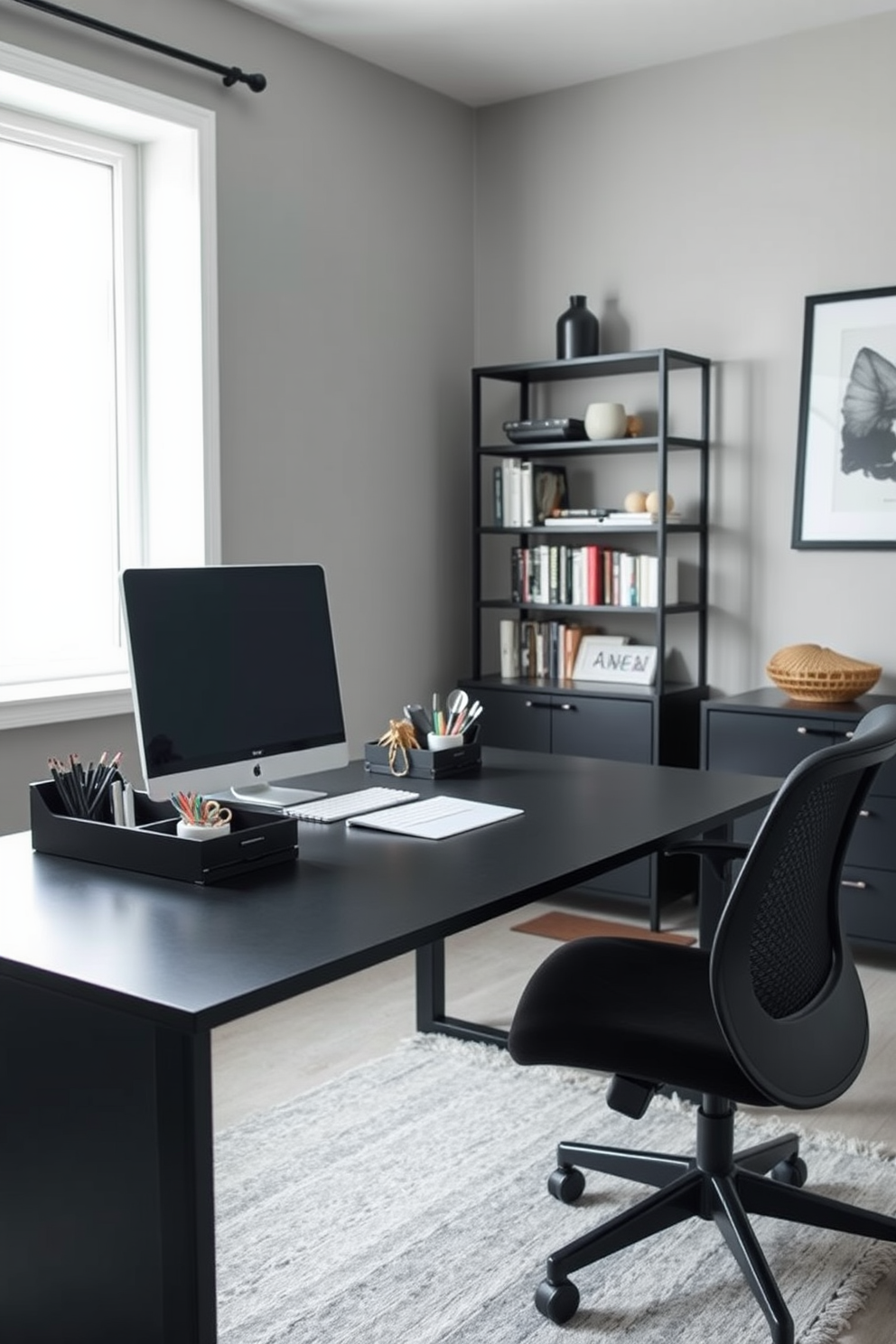 A sleek black desk organizer sits on a minimalist black desk, designed to keep essential office supplies neatly arranged. The workspace features a modern ergonomic chair and a large window that floods the room with natural light. The walls are painted in a soft gray, complementing the black furniture and creating a calm atmosphere. A stylish bookshelf filled with books and decorative items adds personality to the home office space.