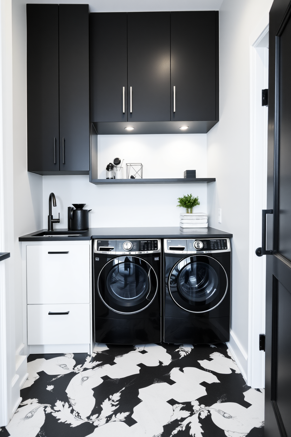 A sleek and modern laundry room featuring minimalist black and white decor. The walls are painted in crisp white, while the cabinetry is a deep matte black, creating a striking contrast. The floor is adorned with large black and white tiles, adding a touch of elegance. A streamlined black washer and dryer are seamlessly integrated into the cabinetry, maintaining a clean and uncluttered look.