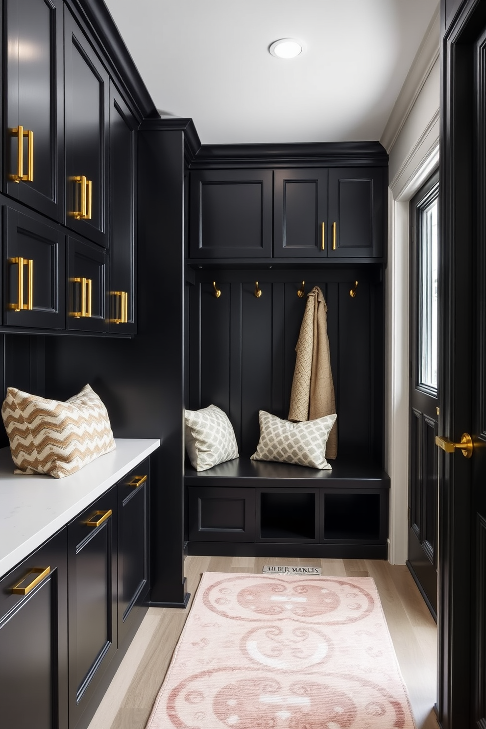 A sleek black mudroom features cabinetry with gold accents that add a touch of elegance. The space is designed with a built-in bench and hooks for coats, complemented by a stylish area rug in muted tones.