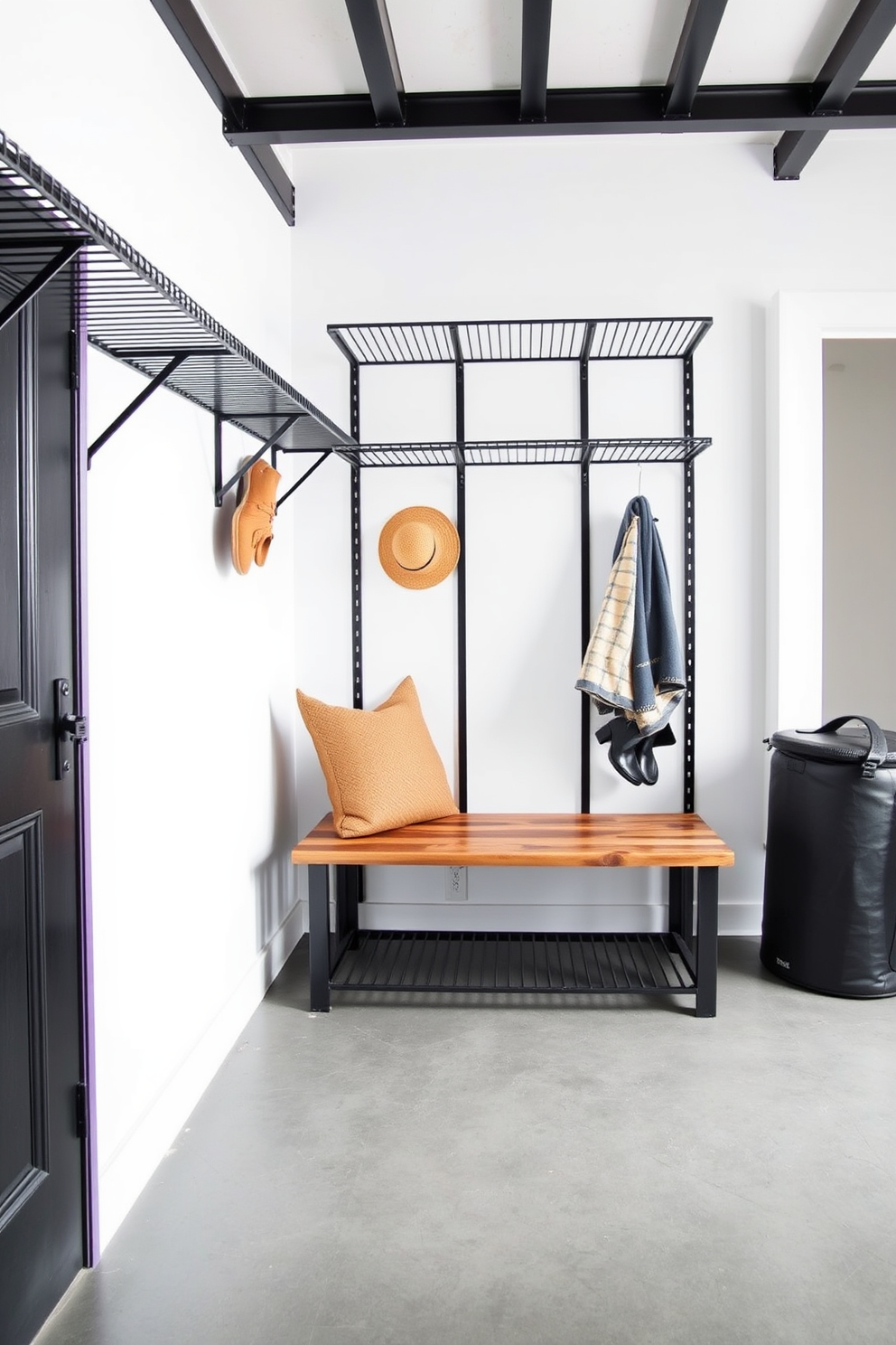 An industrial style mudroom features black metal shelves mounted on the walls for storage and organization. The flooring is a durable gray concrete, complemented by a rustic wooden bench for seating and a touch of warmth.