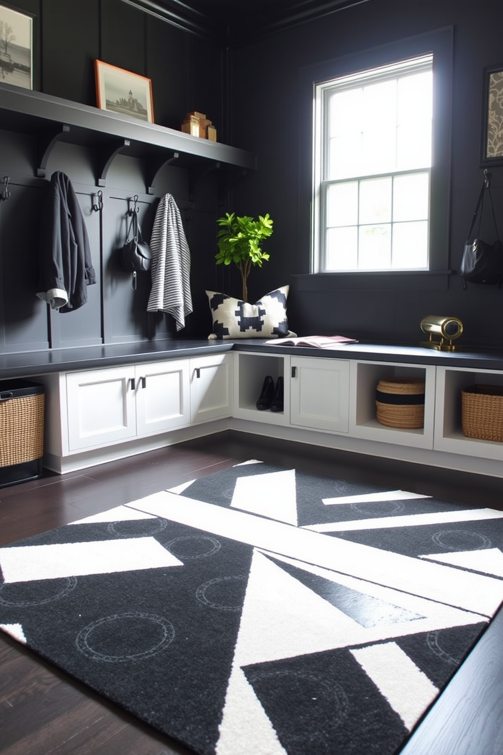 A striking black and white geometric rug lies at the center of the room, featuring bold lines and shapes that create a modern aesthetic. The rug complements the surrounding decor, enhancing the overall visual appeal of the space. The mudroom is designed with a sleek black color palette, featuring built-in storage benches and hooks for coats. Natural light filters in through a window, illuminating the space and highlighting the stylish organization solutions.