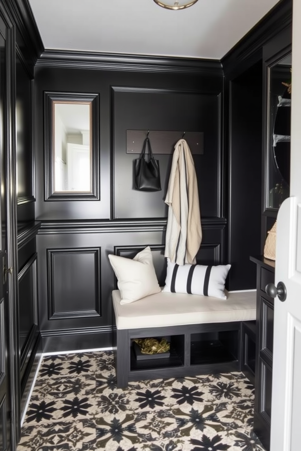 A sophisticated black mudroom featuring elegant wainscoting details. The walls are adorned with black paneling that adds depth and richness to the space. A built-in bench with plush seating is positioned against one wall, complemented by hooks for coats and bags above. The floor is finished with a stylish patterned tile that contrasts beautifully with the black accents.